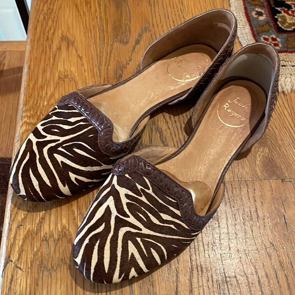 Jack Rogers animal print slides with leather detailing in good used condition
